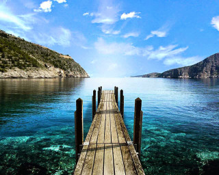 Wooden dock ocean mountains sunny - a wooden dock free wallpaper for desktop