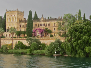 Castle lake trees boat water - a lake in front free wallpaper for desktop
