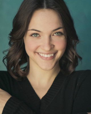 Smiling woman arms crossed black - leesha hannigan free wallpaper for mobile