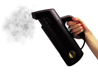 Woman holding black blow dryer - airbrush free wallpaper for desktop