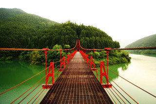 Bridge river red railing forest - a bridge over a river free wallpaper