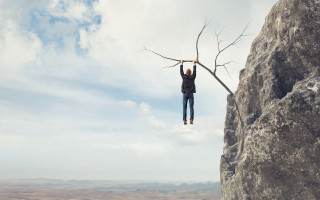 Man standing rock holding tree - extreme free wallpaper