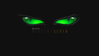 Green glowing eyes black background 2 - a green eye free wallpaper