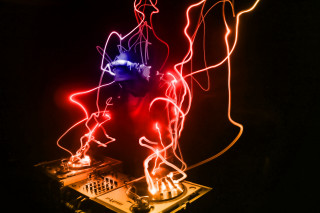 Dj mixing red light black - a red light in the background free wallpaper