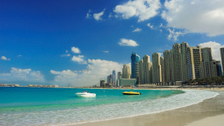 Boat beach cityscape blue sky - the water near a beach free wallpaper
