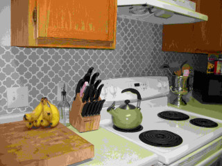 Kitchen stove cuttingboard knives bananas - a stove free wallpaper
