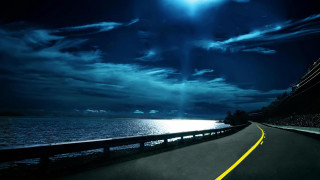 Road hill ocean night bright - nighttime free wallpaper
