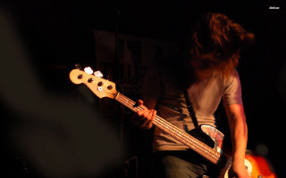 Man playing bass guitar dark - post grunge free wallpaper