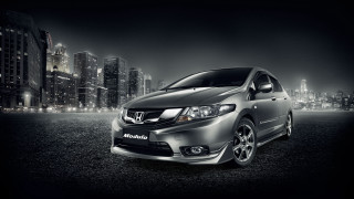 Silver car city night lights - a silver car free wallpaper for desktop