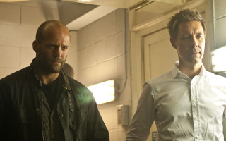 Two men standing room mirror - a mirror free wallpaper