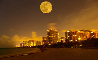 Full moon city night beach - over a city free wallpaper for desktop