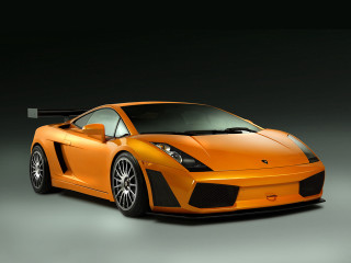 Orange sports car dark room 3 - nice looking orange sports car free wallpaper