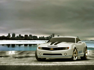 White car ocean city skyline - free cars wallpaper