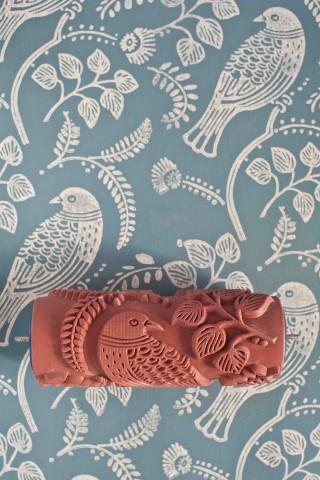 Clay bird sculpture wallpaper blue - white flower and leaves free wallpaper