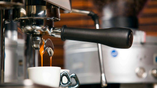Coffee machine pouring cup handle - a cup free wallpaper