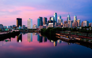 City skyline river dusk pink - sky in the background free wallpaper