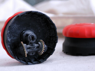 Toy wheel red black white - product photo free wallpaper for desktop