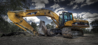 Yellow bulldozer parked field dead - the ground in front free wallpaper for desktop