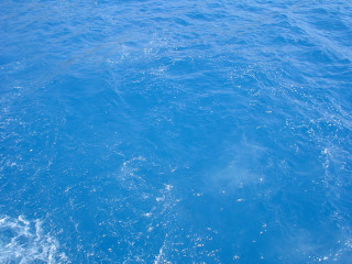 Blue ocean boat distance water 3 - a blue ocean free wallpaper