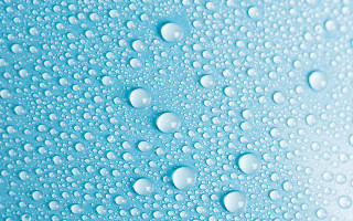 Water droplets blue surface white - a close up of water droplets free wallpaper for desktop