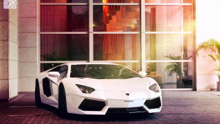 White sports car building large 3 - a white sports car free wallpaper for desktop