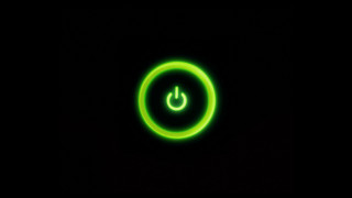 Green glowing button black background 2 - evariste vital luminai free wallpaper