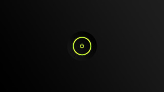 Black background green light circle - a green light in the middle free wallpaper