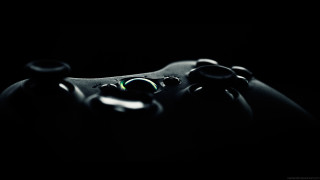 Close up video game controller 2 - a green light free wallpaper for desktop