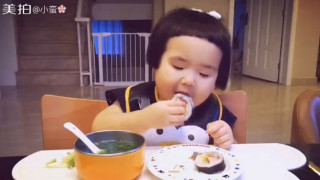 Little girl eating sushi table - funny free wallpaper for desktop