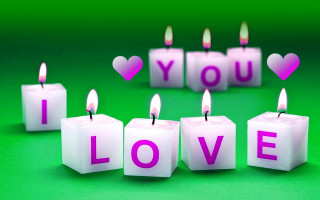 Candles i love you lit - a group of candles free wallpaper