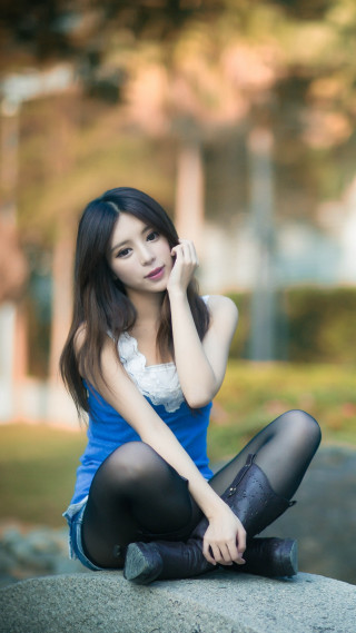 Woman sitting rock legs crossed - du qiong free wallpaper for mobile