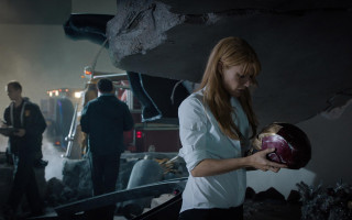 Woman bowling ball crowd fire - a woman holding free wallpaper for desktop