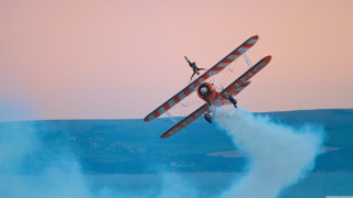Biplane flying water person back - eleanor best free wallpaper