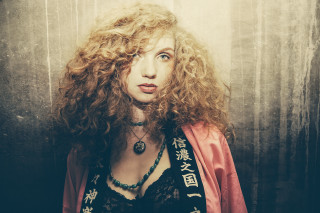 Woman curly hair red jacket - art nouveau free wallpaper
