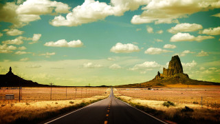 Long road mountain background fenced - a long road free wallpaper
