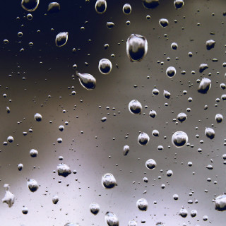 Close up window water drops 2 - free rain wallpaper for tablet