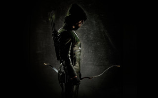 Man black outfit bow arrow 3 - a black outfit holding free wallpaper for desktop