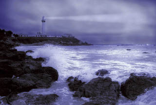 Lighthouse rocky shore waves stormy - a rocky shore free wallpaper for desktop