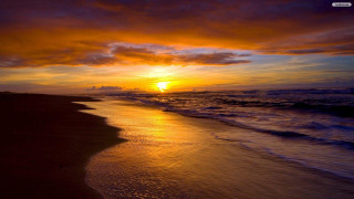 Sunset ocean waves beach person 14 - the beach in the distance free wallpaper
