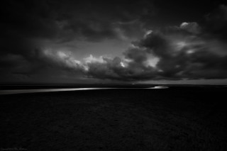 Cloudy sky black white water - chris friel free wallpaper