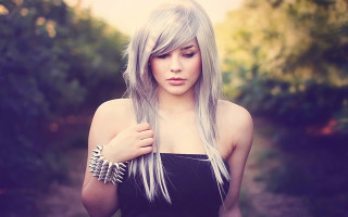 Woman long hair bracelet forest - tree and bushes behind her free wallpaper