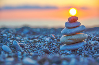 Stack rocks beach ocean sunset - symmetric free wallpaper