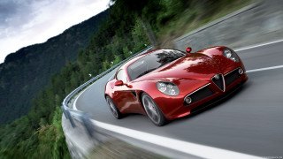 Red sports car mountain road 5 - a red sports car free wallpaper
