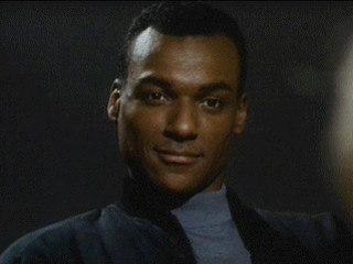 Man black shirt tie serious - christopher perkins free wallpaper