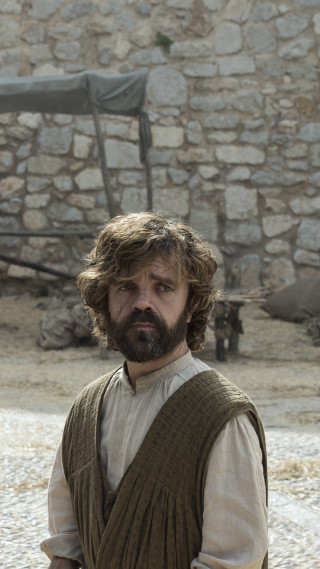 Bearded man vest stone wall - a door free wallpaper for mobile