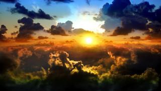 Sunset clouds plane sky yellow - the sun in the distance free wallpaper