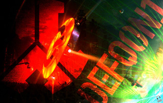 Colorful light show person background - a person in the background free wallpaper