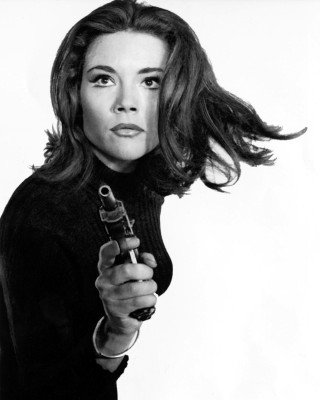Woman holding gun serious look 3 - barbara nessim free wallpaper