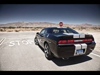 Black sports car parking lot 32 - a stop sign free wallpaper for desktop