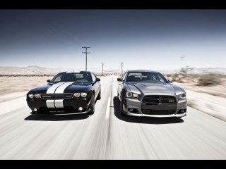 Two cars driving road desert - two car free wallpaper